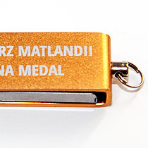 pendrive pomarańczowy, grawer na aluminium
